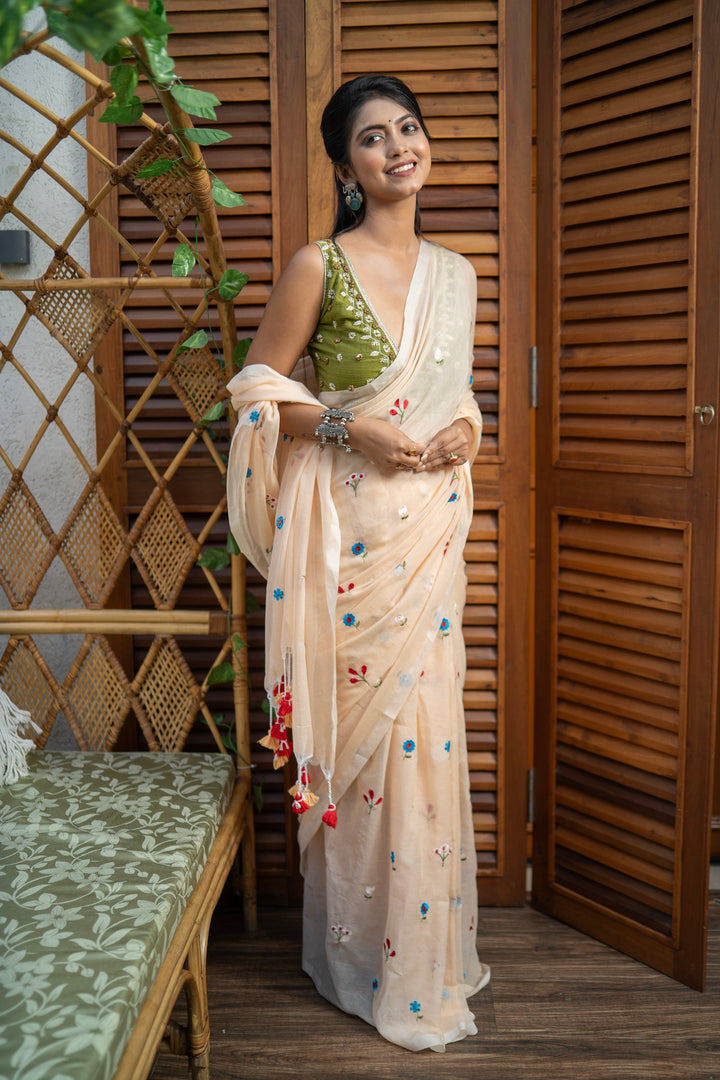 Ivory Cream Mul Cotton Saree with Multicolour Floral Motifs & Tassel Pallu