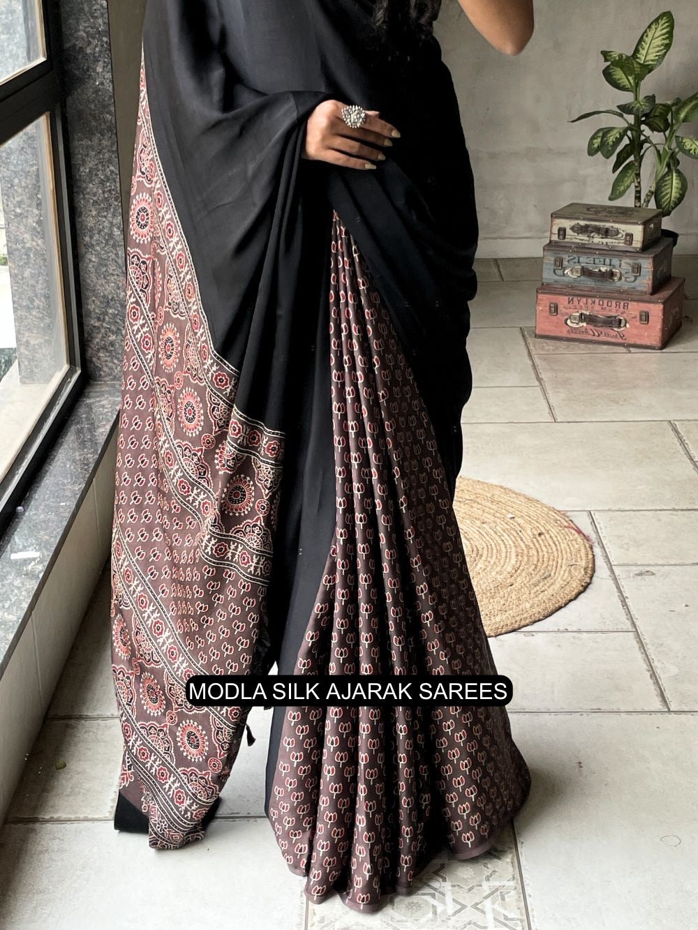 Black Modal Silk Ajrakh Printed Saree with Traditional Heritage Pallu, Intricate Ethnic Motifs & Tassel Detailing
