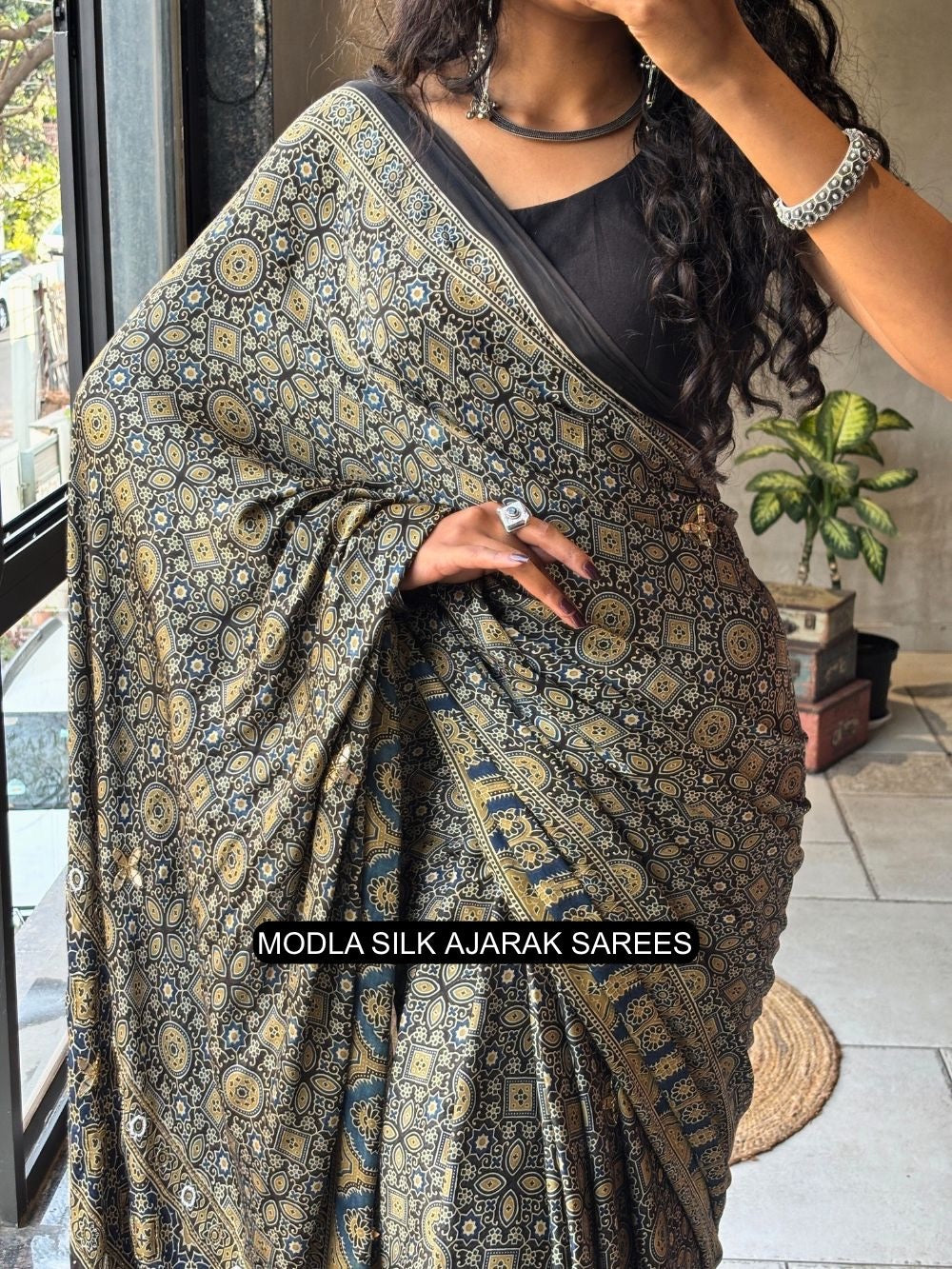 Ajrakh Chinnon Printed Saree with Tassel Detailing & Attached Blouse (No Mirror Work)