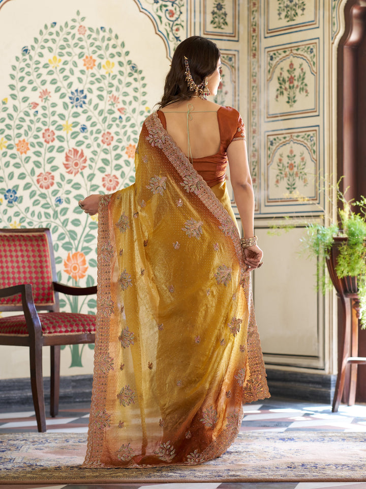 Dual Tone Mustard Yellow & Rust Fendy Satin Embroidered Saree with Floral Motifs & Zari Border | Designer Festive Saree with Tassels & Heavy Embroidered Blouse