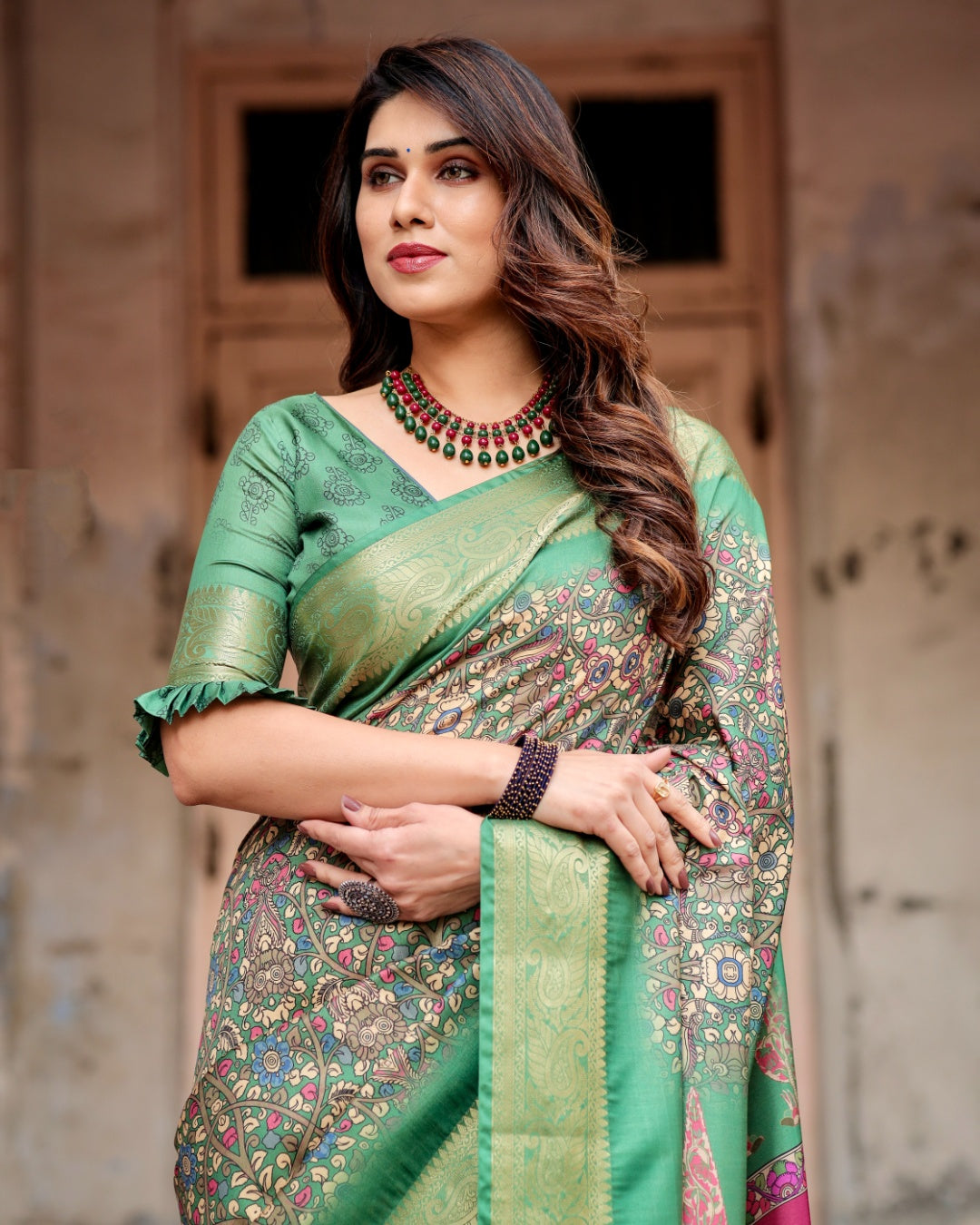 Sage Green Tussar Silk Saree with Kalamkari Print, Zari Border, Statement Pallu & Tassels
