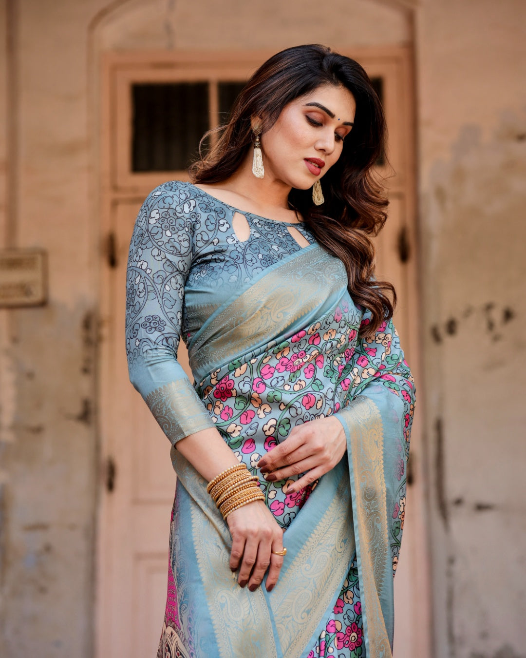 Powder Blue Tussar Silk Saree with Multicolour Floral Print, Ornamental Pallu, Zari Border & Tassels