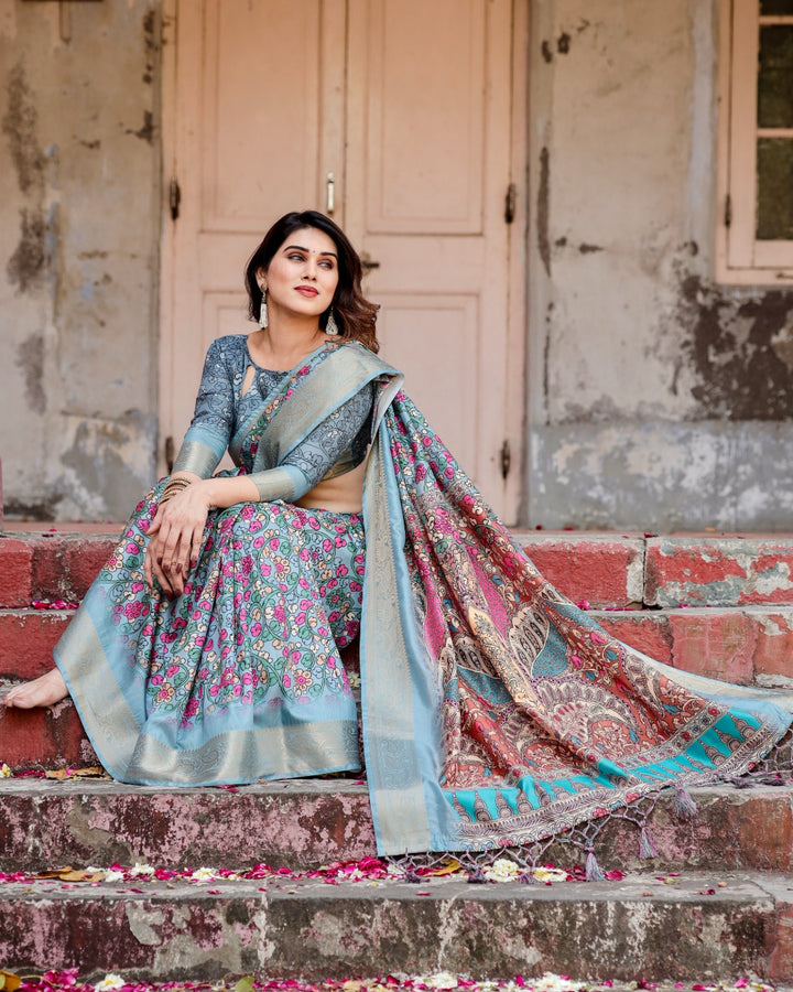 Powder Blue Tussar Silk Saree with Multicolour Floral Print, Ornamental Pallu, Zari Border & Tassels