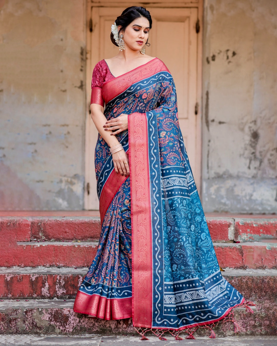 Navy Blue Tussar Silk Saree with Floral Print, Coral Pink Zari Border, Statement Pallu & Tassels