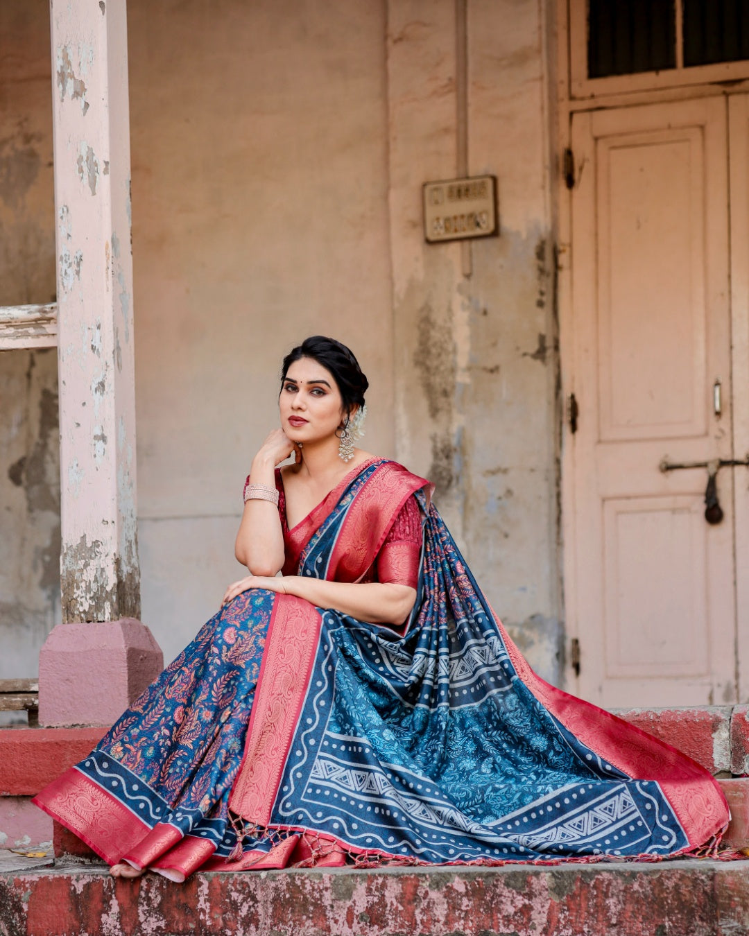 Navy Blue Tussar Silk Saree with Floral Print, Coral Pink Zari Border, Statement Pallu & Tassels