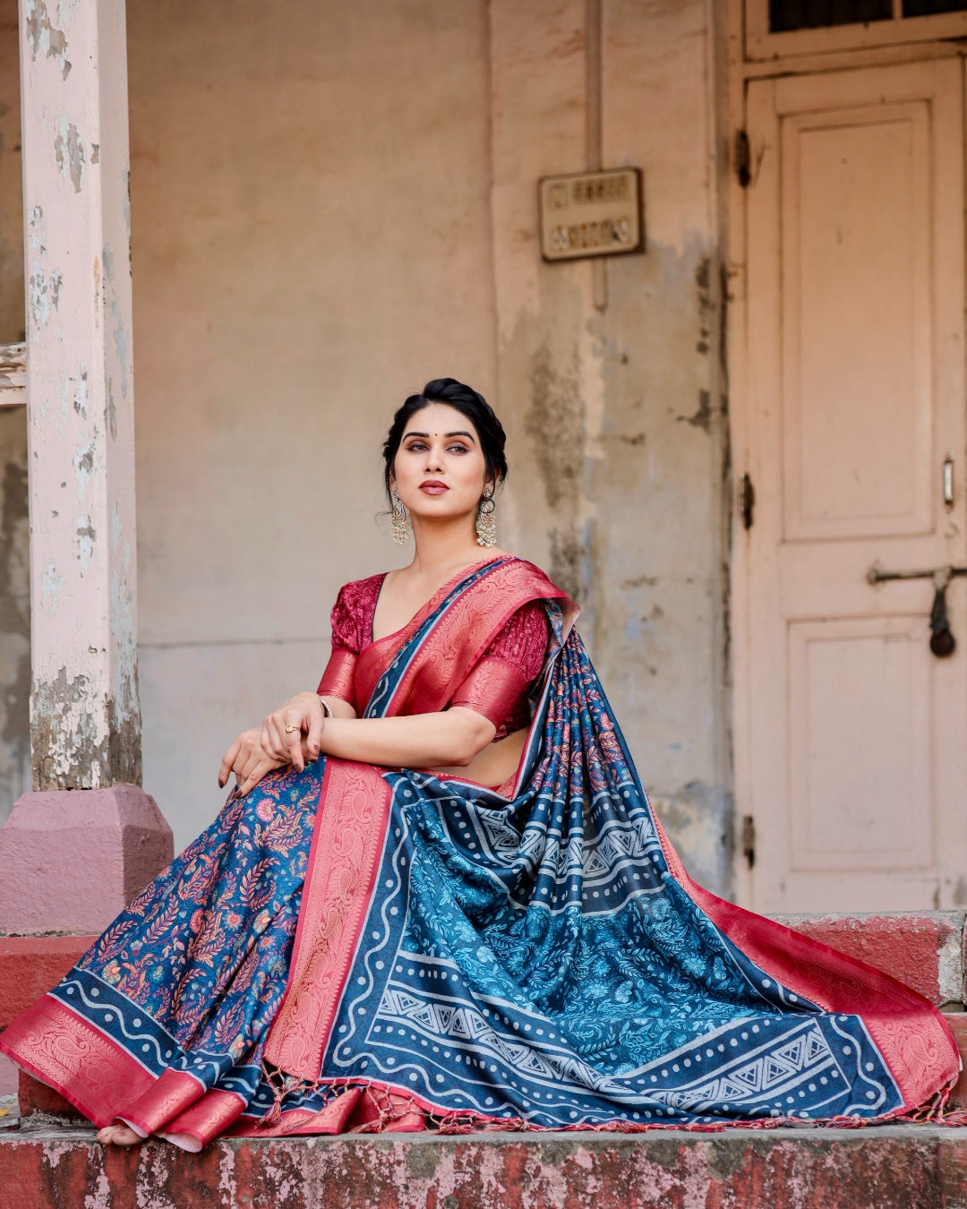 Navy Blue Tussar Silk Saree with Floral Print, Coral Pink Zari Border, Statement Pallu & Tassels