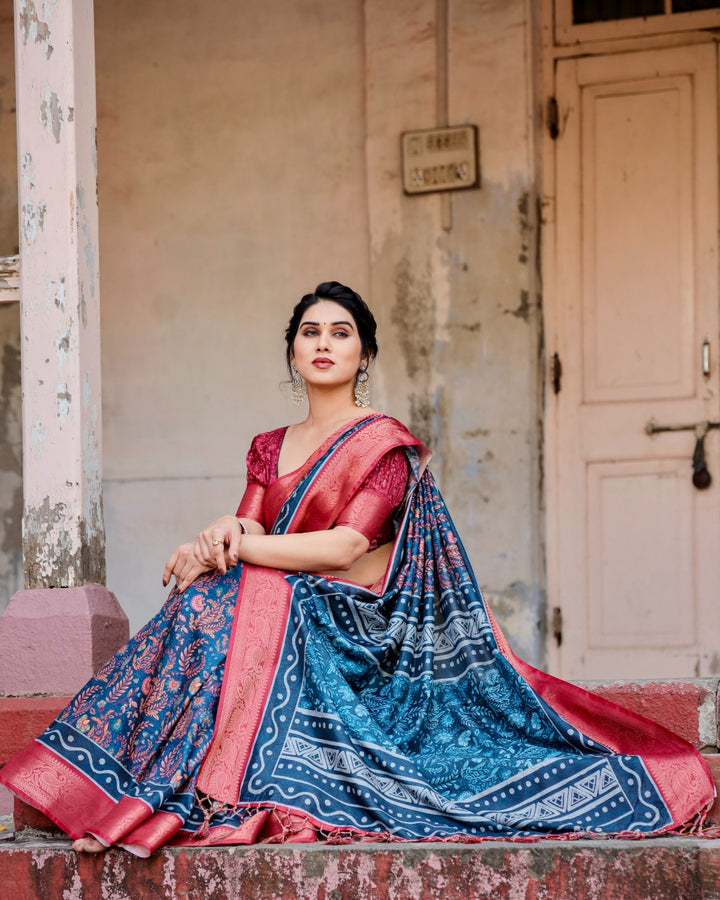 Navy Blue Tussar Silk Saree with Floral Print, Coral Pink Zari Border, Statement Pallu & Tassels
