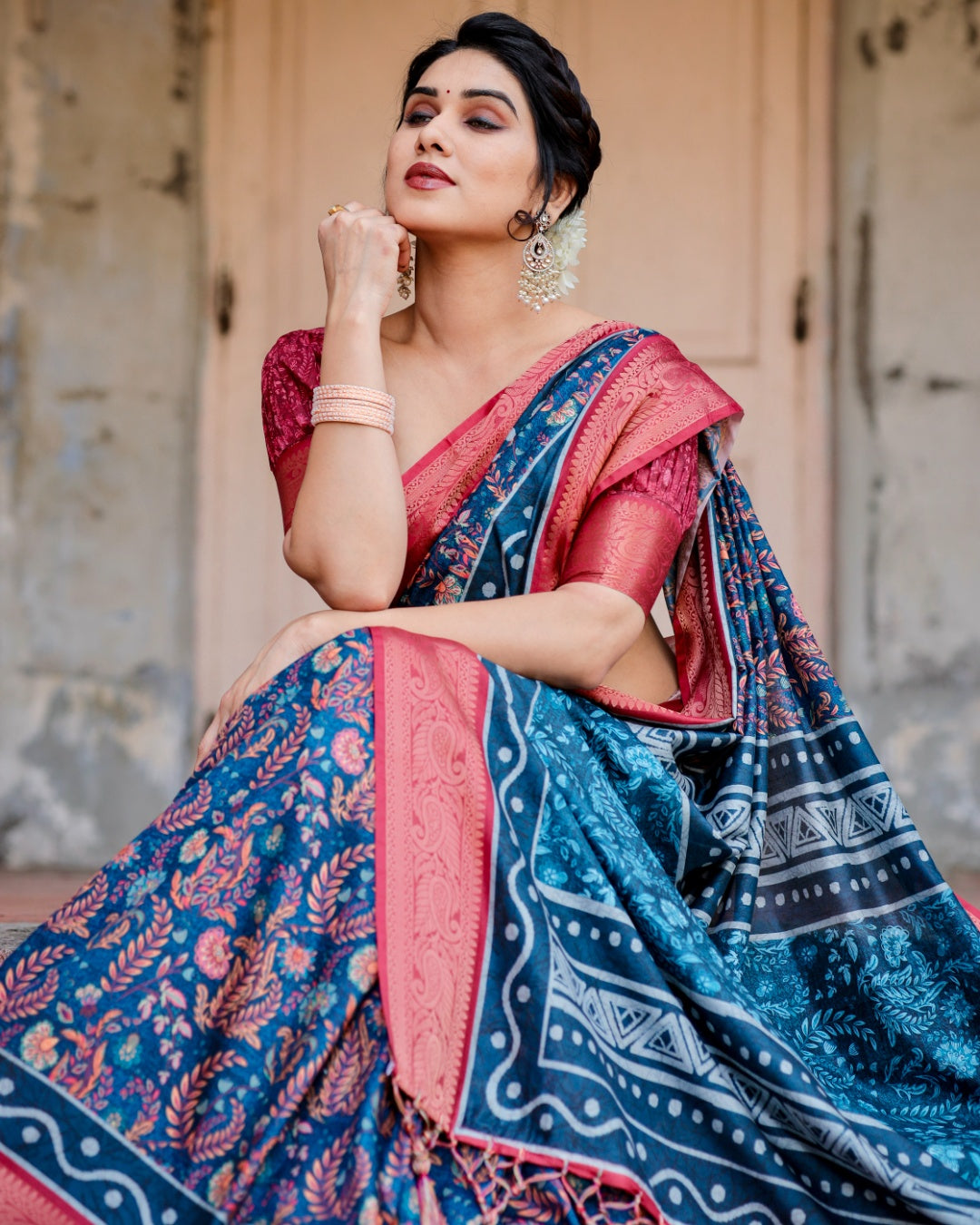 Navy Blue Tussar Silk Saree with Floral Print, Coral Pink Zari Border, Statement Pallu & Tassels