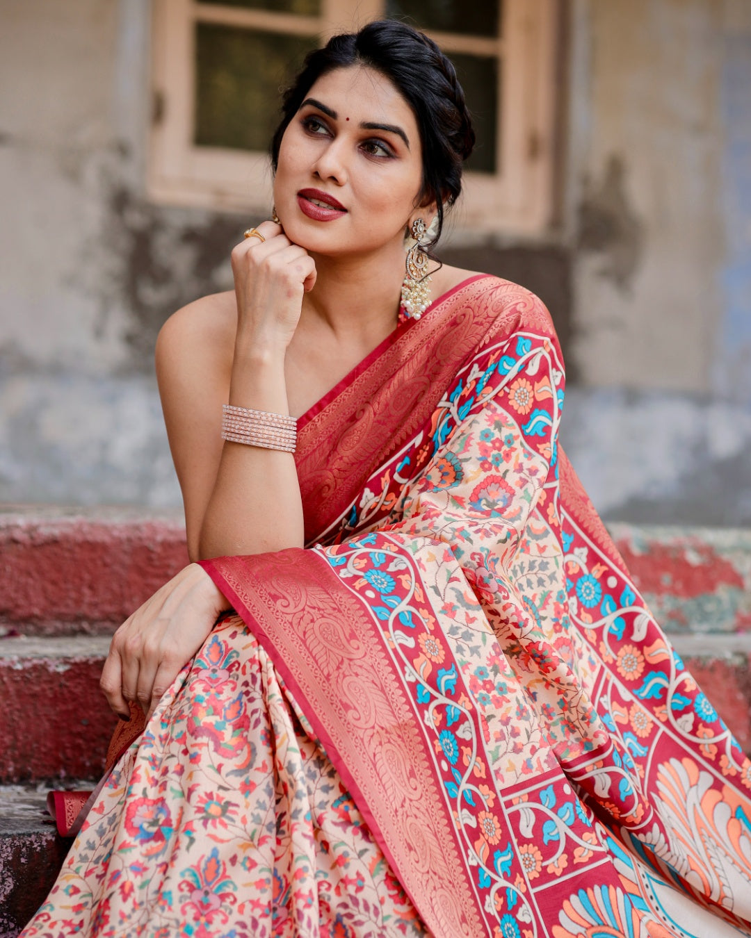 Ivory Tussar Silk Saree with Floral Print, Coral Red Zari Border, Peacock Pallu & Tassels