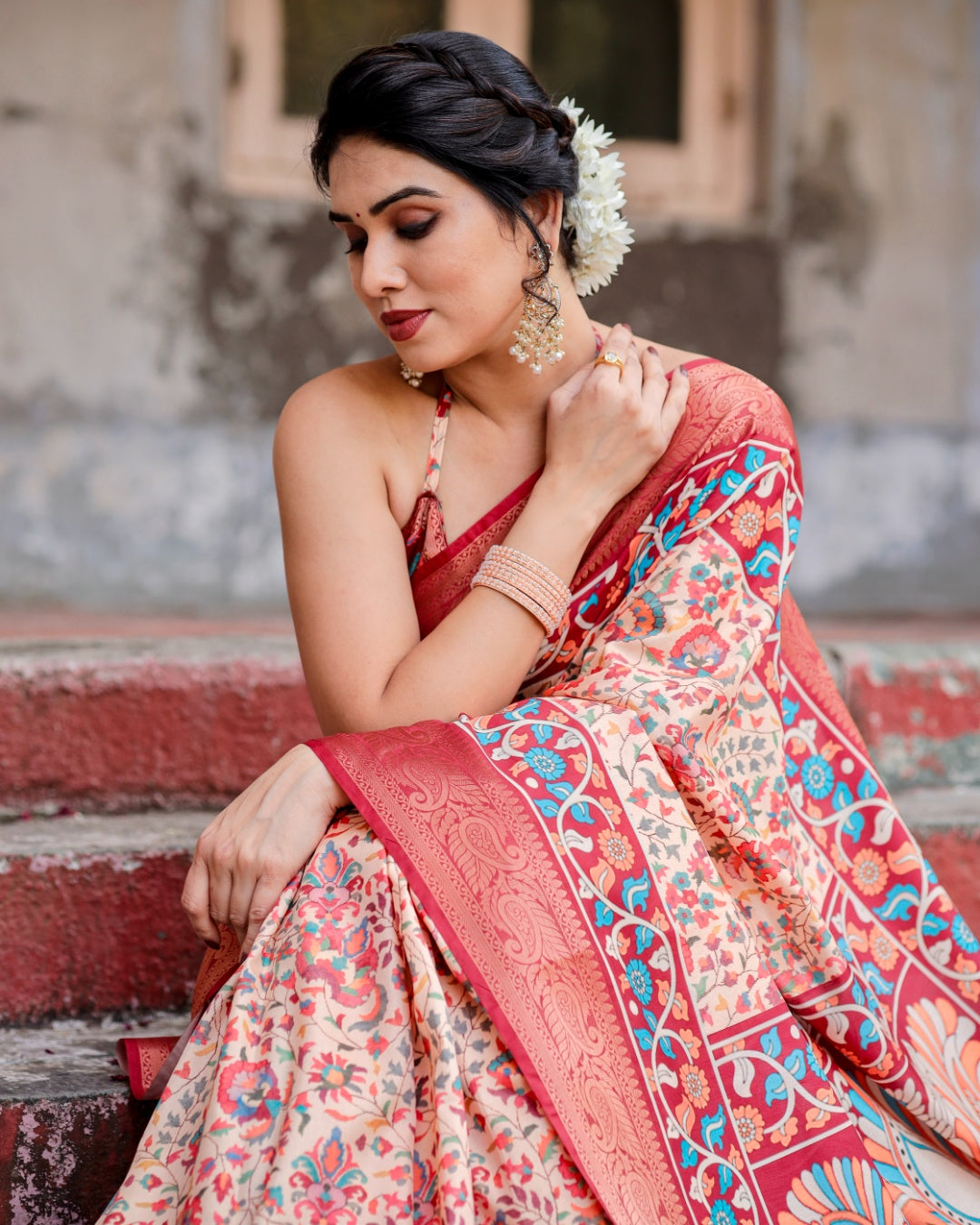 Ivory Tussar Silk Saree with Floral Print, Coral Red Zari Border, Peacock Pallu & Tassels