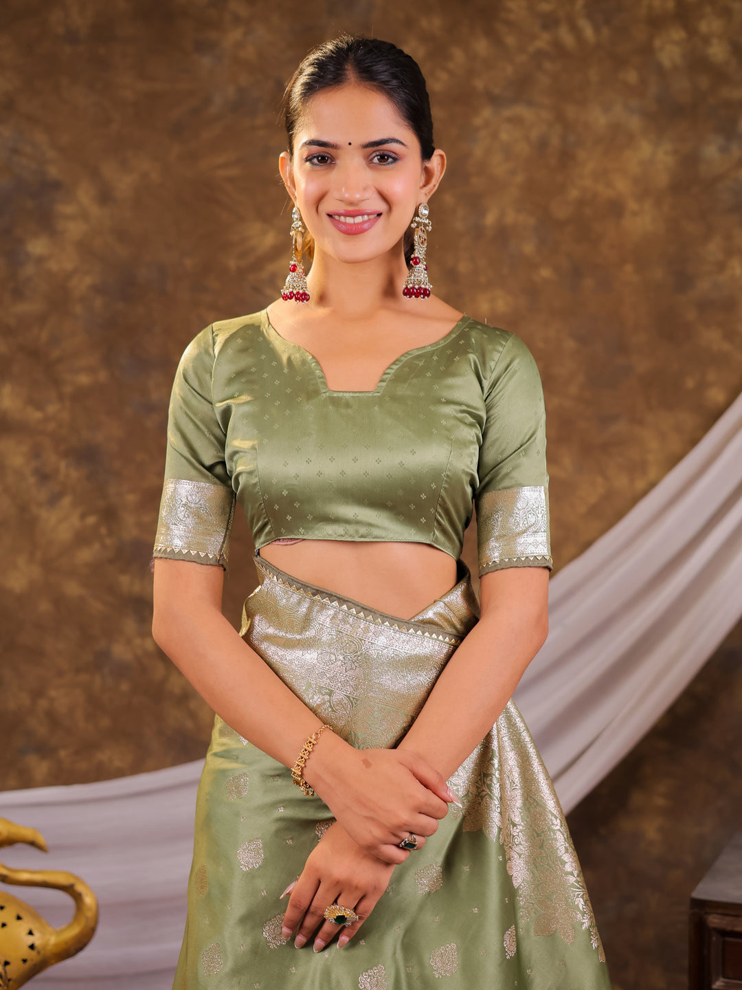 Sage Green Kanjivaram Banarasi Satin Silk Saree with Silver Zari Weaving, Floral Woven Border, Rich Designer Pallu & Tassels