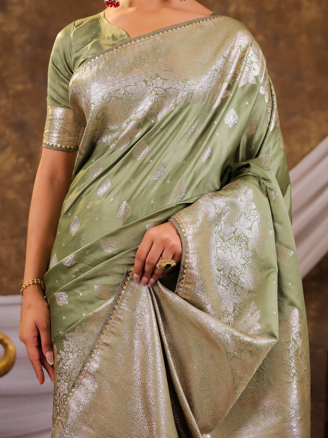 Sage Green Kanjivaram Banarasi Satin Silk Saree with Silver Zari Weaving, Floral Woven Border, Rich Designer Pallu & Tassels
