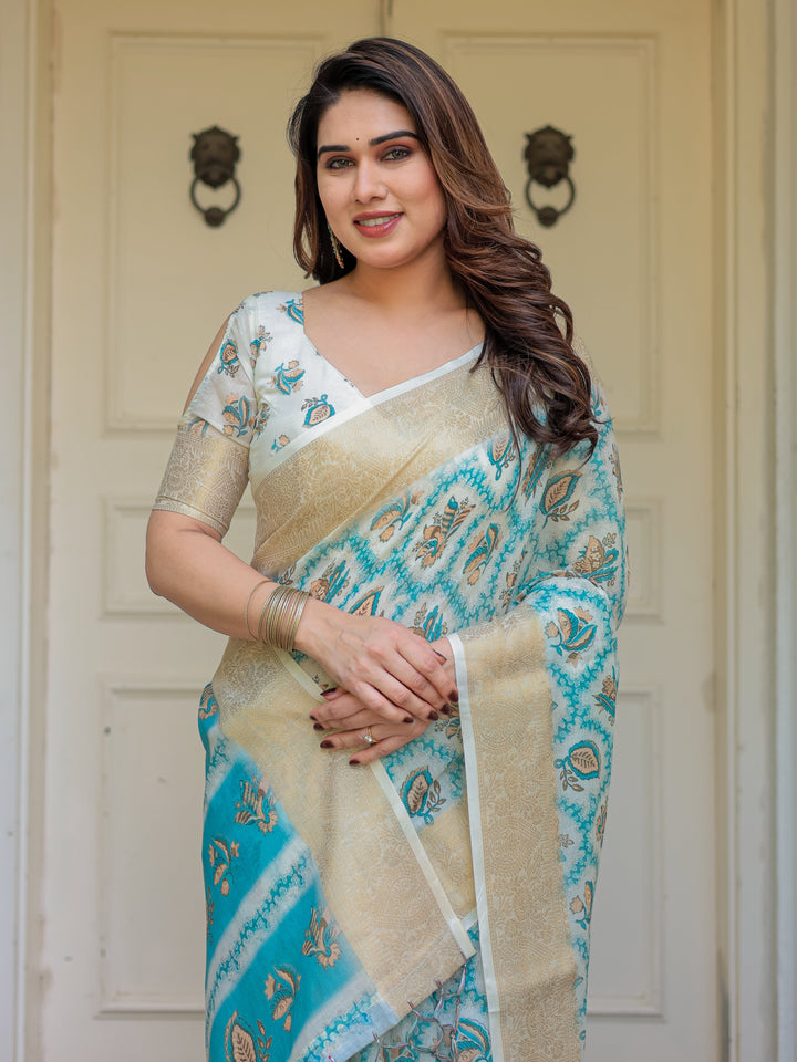 Turquoise Blue Handloom Cotton Printed Saree with Zari Border & Tassel Detailing – Traditional Ethnic Wear