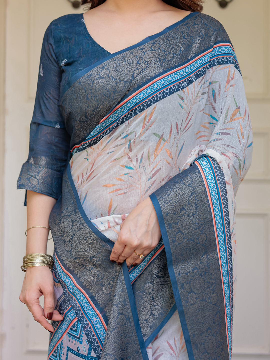 Steel Grey & Teal Handloom Cotton Printed Saree with Zari Border & Tassels – Classic Ethnic Wear