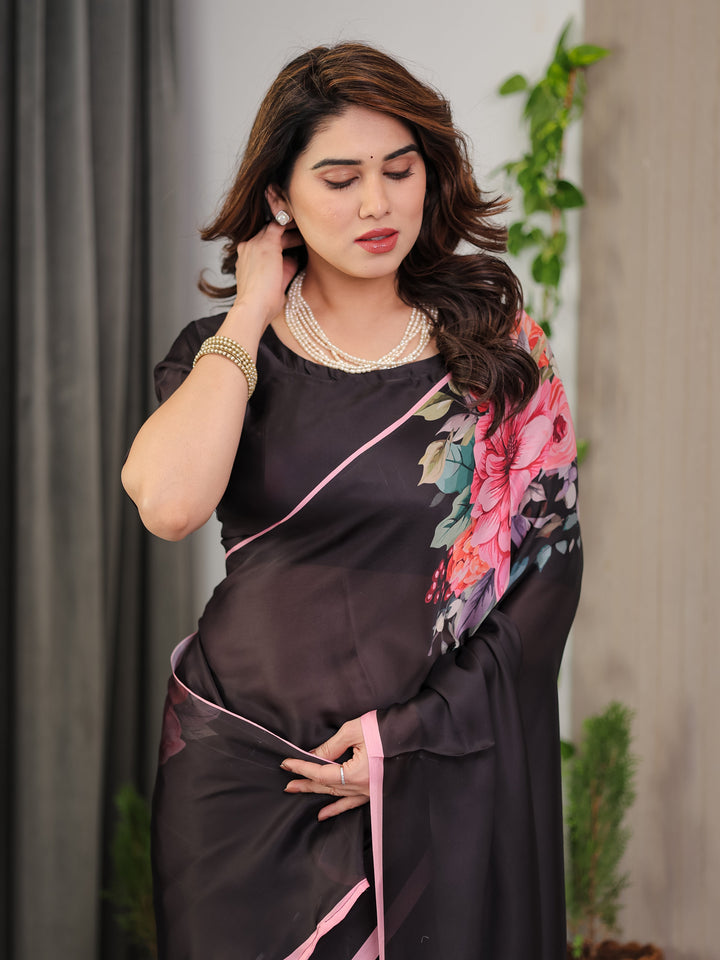 Black Satin Georgette Floral Printed Saree with Soft Pink Border & Attached Blouse – Elegant Designer Partywear Drape