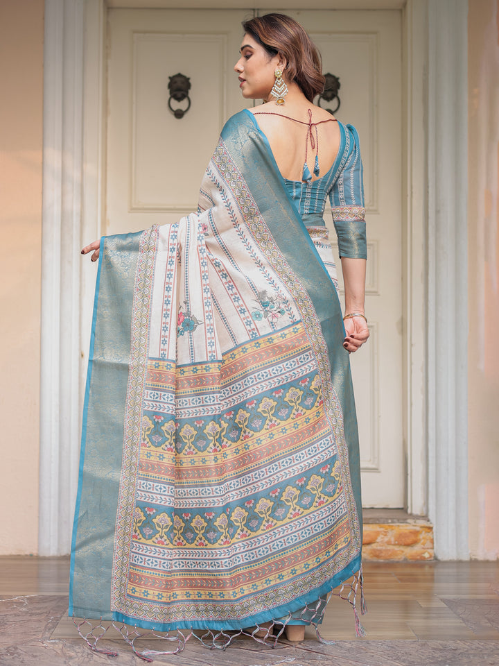 Off-White & Aqua Teal Traditional Printed Saree with Rich Zari Border & Tassels – Elegant Ethnic Festive Wear