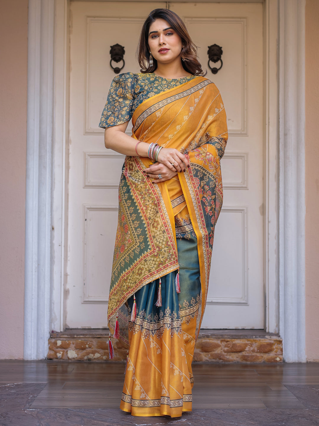 Mustard Yellow & Teal Green Floral Panel Printed Handloom Cotton Saree with Heritage Border & Tassels – Festive Traditional Wear