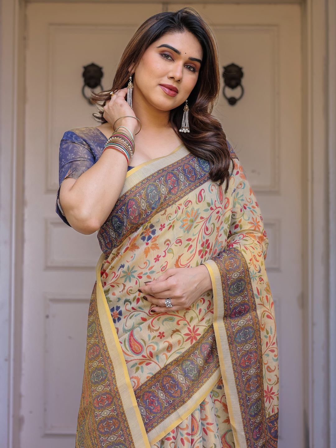 Cream & Navy Blue Floral Paisley Printed Handloom Cotton Saree with Heritage Border & Tassels – Festive Ethnic Wear