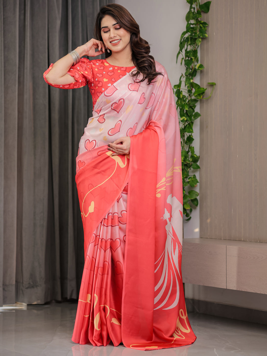 Coral Red & Blush Pink Heart Printed Satin Georgette Saree with Romantic Couple Pallu and Attached Heart Print Blouse – 5.5 Meter Designer Saree for Valentine’s Day & Anniversary Wear