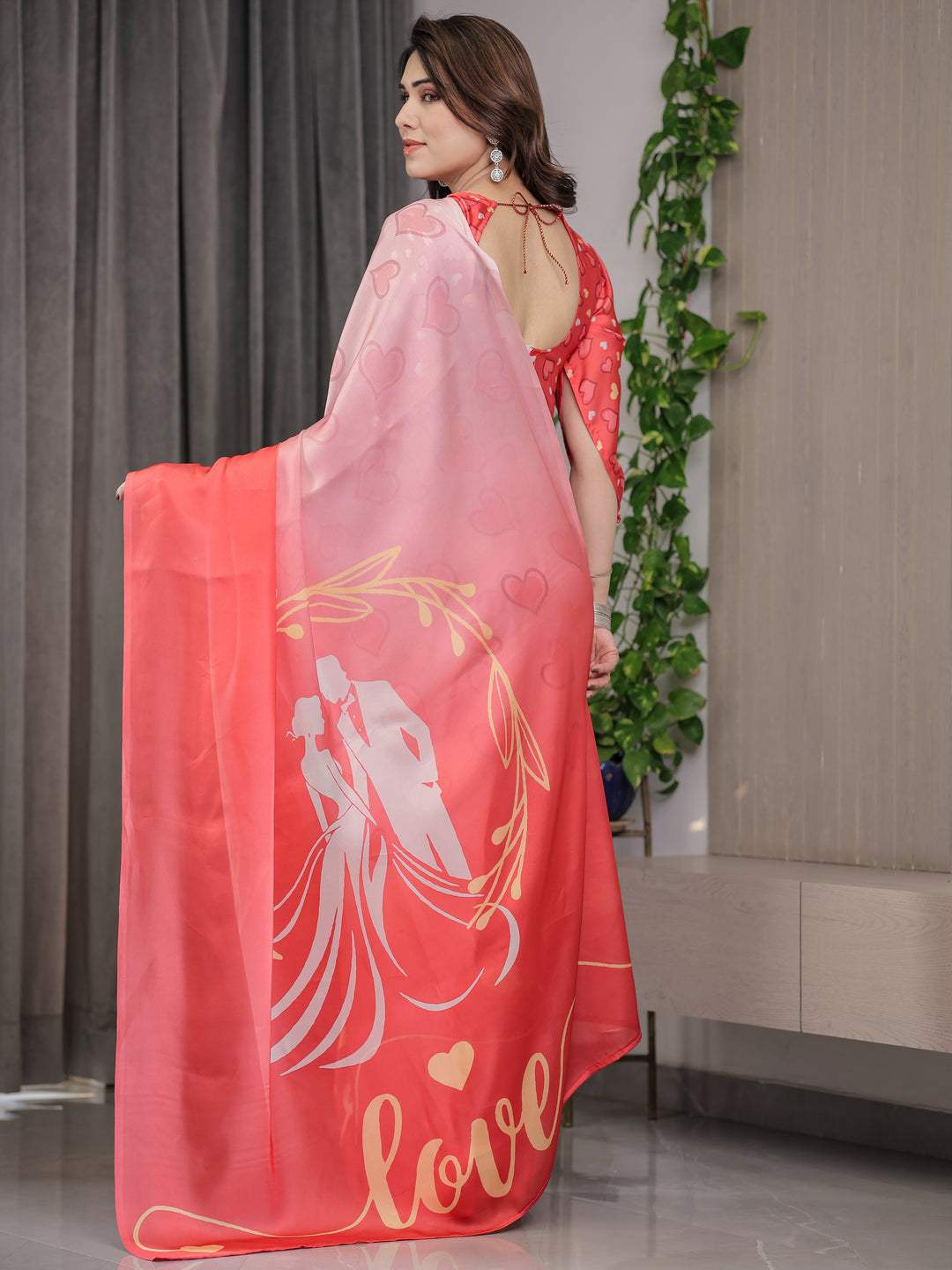 Coral Red & Blush Pink Heart Printed Satin Georgette Saree with Romantic Couple Pallu and Attached Heart Print Blouse – 5.5 Meter Designer Saree for Valentine’s Day & Anniversary Wear