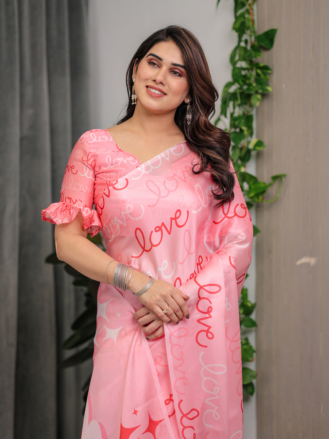 Blush Pink Satin Georgette Saree with All-Over Love Typography Print and Attached Matching Printed Blouse – 5.5 Meter Romantic Designer Saree for Valentine’s Day & Anniversary Wear