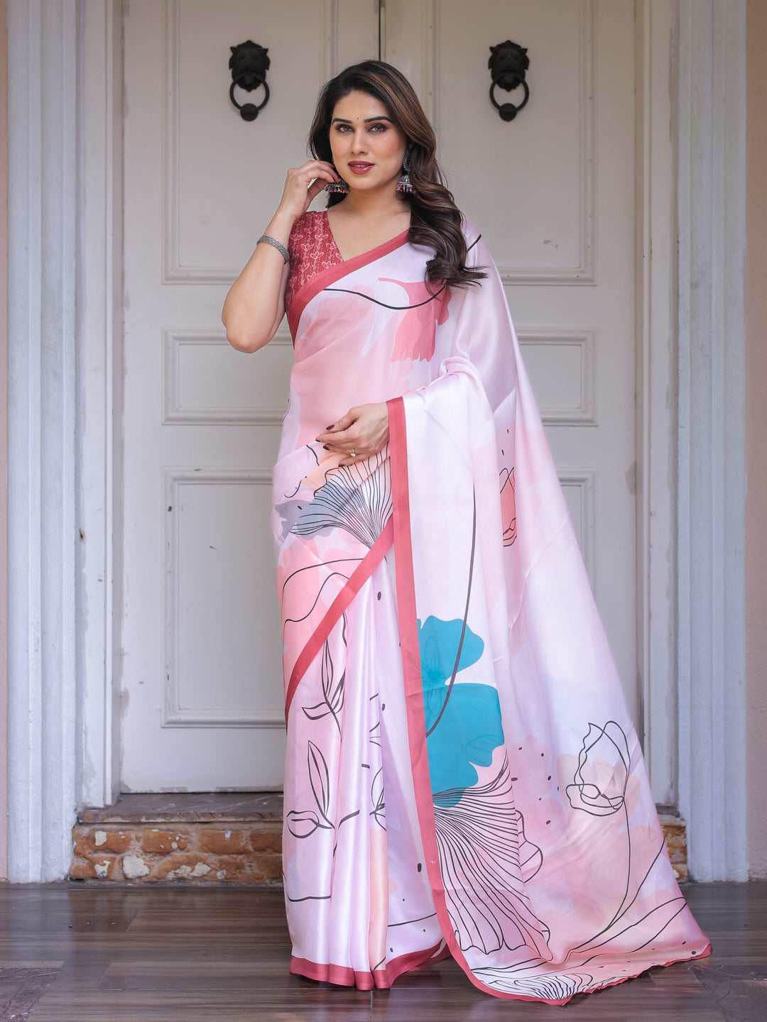 Pastel Pink Abstract Floral Printed Satin Georgette Saree with Contrast Coral Border & Matching Blouse – Modern Elegant Wear