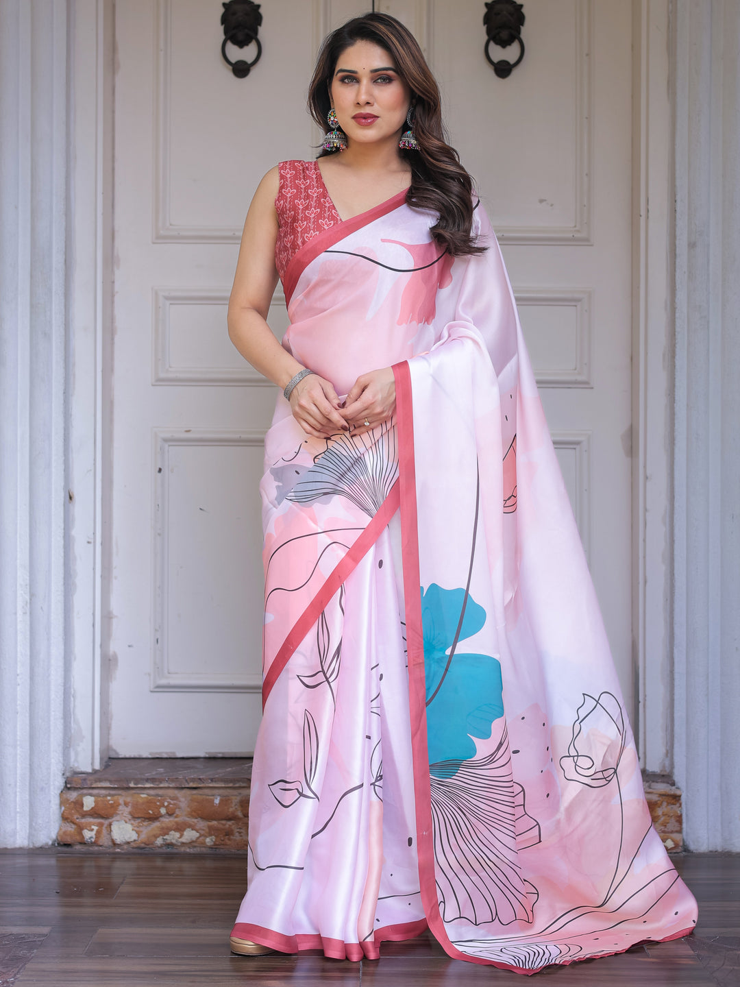 Pastel Pink Abstract Floral Printed Satin Georgette Saree with Contrast Coral Border & Matching Blouse – Modern Elegant Wear