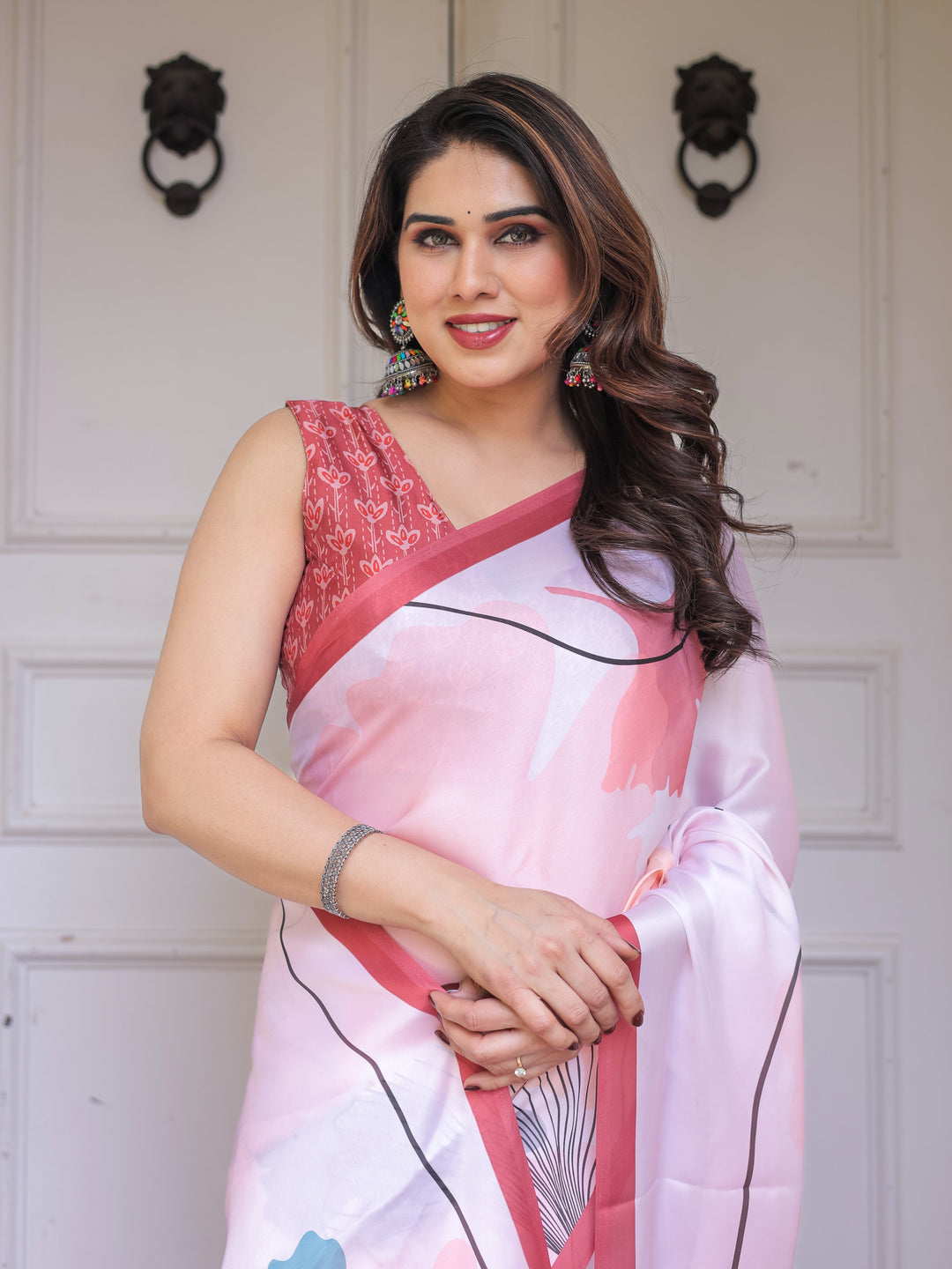 Pastel Pink Abstract Floral Printed Satin Georgette Saree with Contrast Coral Border & Matching Blouse – Modern Elegant Wear