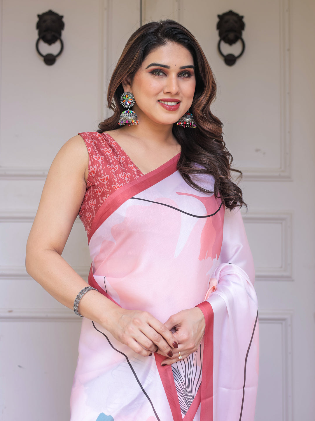 Pastel Pink Abstract Floral Printed Satin Georgette Saree with Contrast Coral Border & Matching Blouse – Modern Elegant Wear