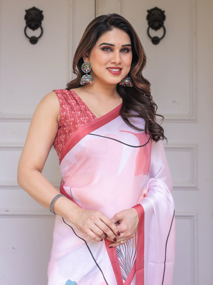 Pastel Pink Abstract Floral Printed Satin Georgette Saree with Contrast Coral Border & Matching Blouse – Modern Elegant Wear