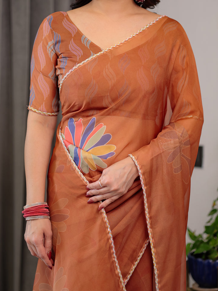 Rust Orange Floral Printed Organza Saree with Multicolour Lace Border | Lightweight Designer Organza Saree with Attached Blouse Piece | Elegant Festive & Party Wear Saree