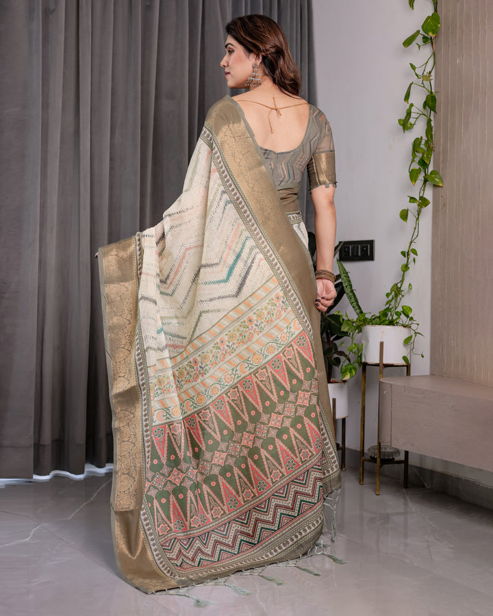 Elegant Cream & Gold Woven Ikat Silk Saree with Designer Border With Tassles