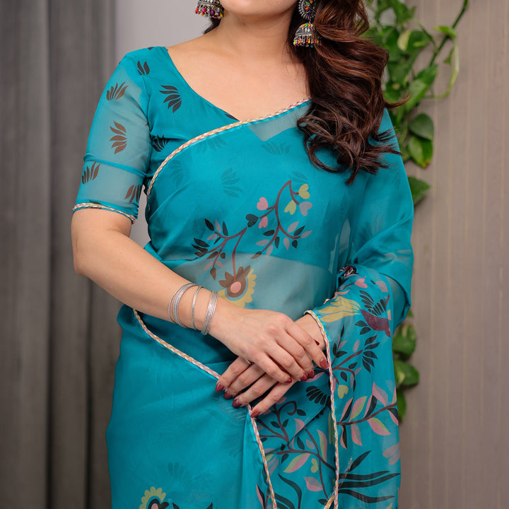 Teal Green Printed Organza Saree with Floral & Bird Motifs and Multicolour Lace Border | Designer Lightweight Organza Saree with Attached Blouse Piece | Elegant Festive & Party Wear Saree
