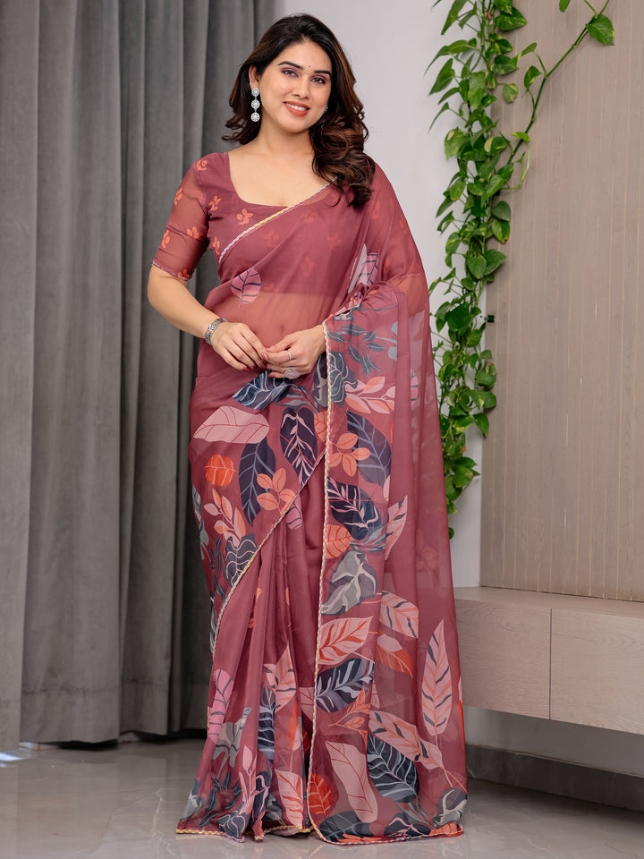 Rust Wine Printed Organza Saree with Tropical Leaf Border | Designer Lightweight Sheer Organza Saree with Botanical Prints & Attached Blouse Piece | Elegant Festive & Party Wear Saree