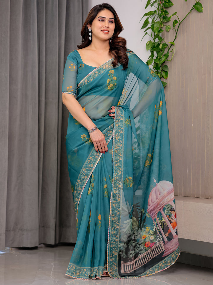 Teal Green Scenic Printed Organza Saree with Garden Pavilion Artwork Pallu | Designer Lightweight Organza Saree with Floral Motifs & Decorative Border | Festive & Party Wear Saree with Blouse Piece