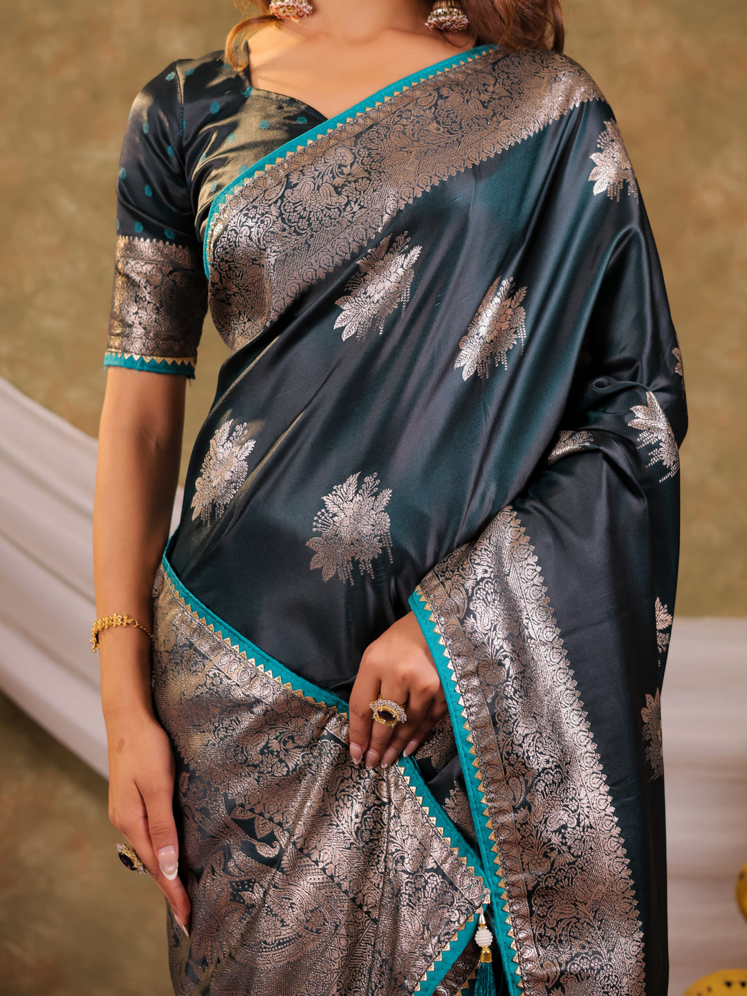 Teal Green Kanjivaram Banarasi Satin Silk Saree with Silver Zari Weaving, Heritage Floral Border & Tassel Detailing