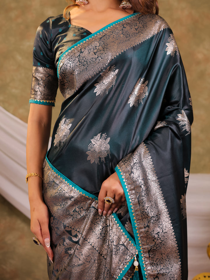 Teal Green Kanjivaram Banarasi Satin Silk Saree with Silver Zari Weaving, Heritage Floral Border & Tassel Detailing