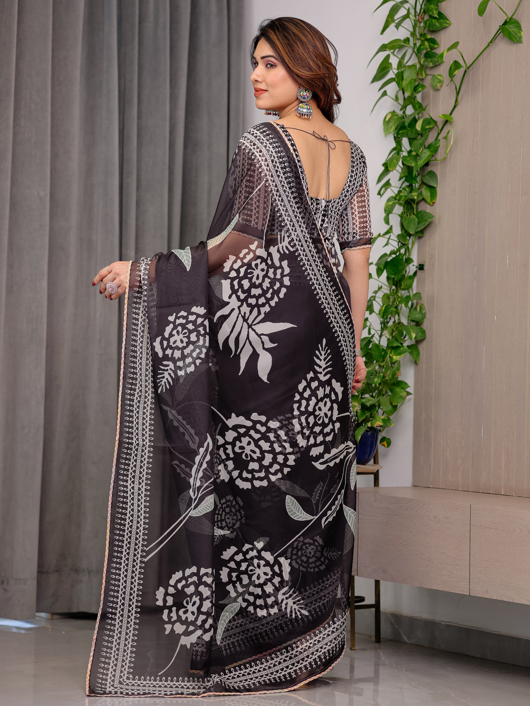 Elegant Black Floral Printed Organza Saree with Intricate Ethnic Border & Multicolour Lace Edges | Lightweight Designer Organza Saree with Attached Blouse Piece | Festive & Party Wear Saree