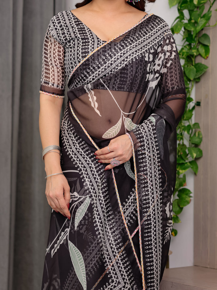 Elegant Black Floral Printed Organza Saree with Intricate Ethnic Border & Multicolour Lace Edges | Lightweight Designer Organza Saree with Attached Blouse Piece | Festive & Party Wear Saree