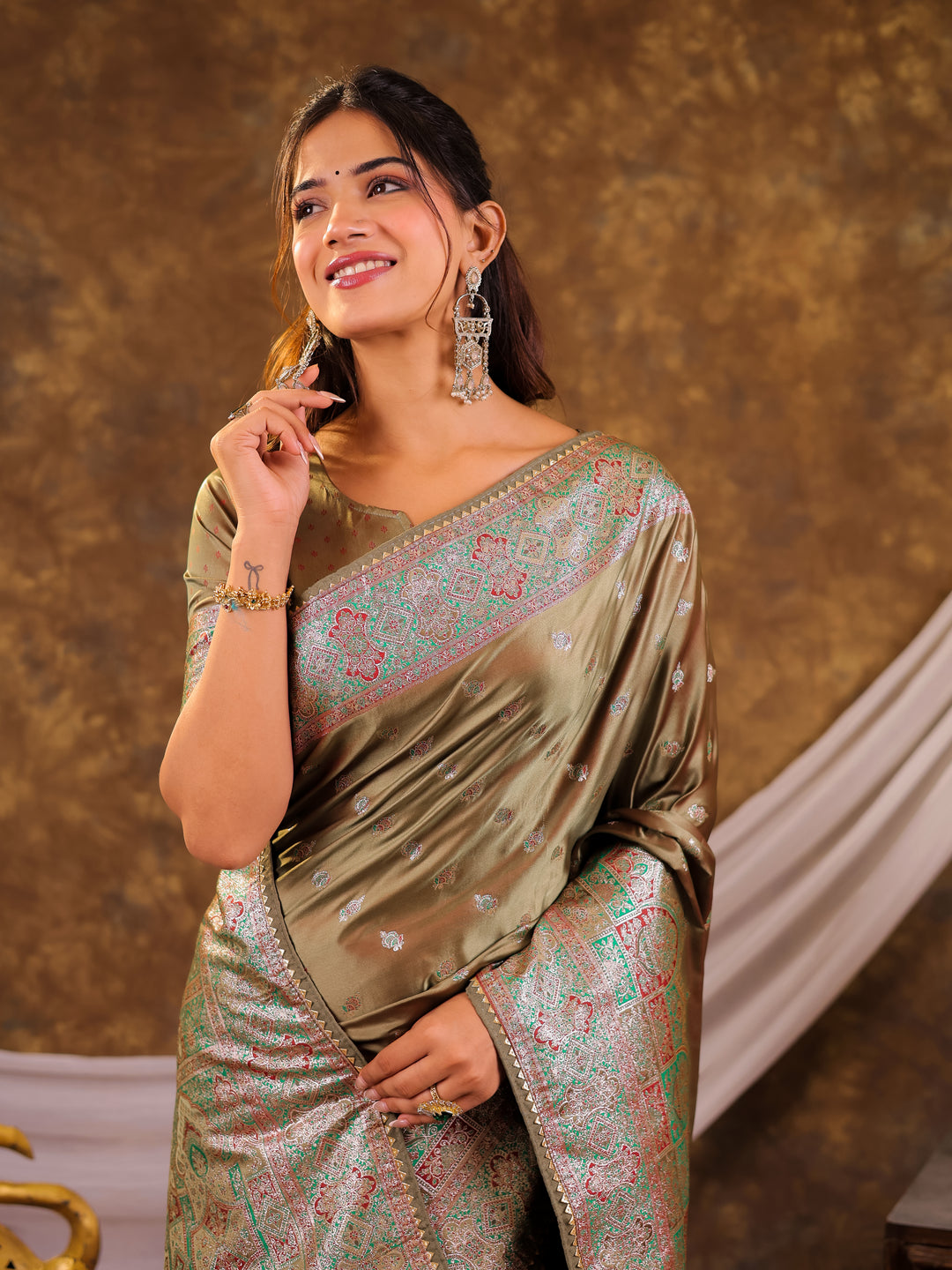 Olive Green Kanjivaram Banarasi Satin Silk Saree with Antique Silver Zari Weaving, Heritage Pallu & Tassel Detailing