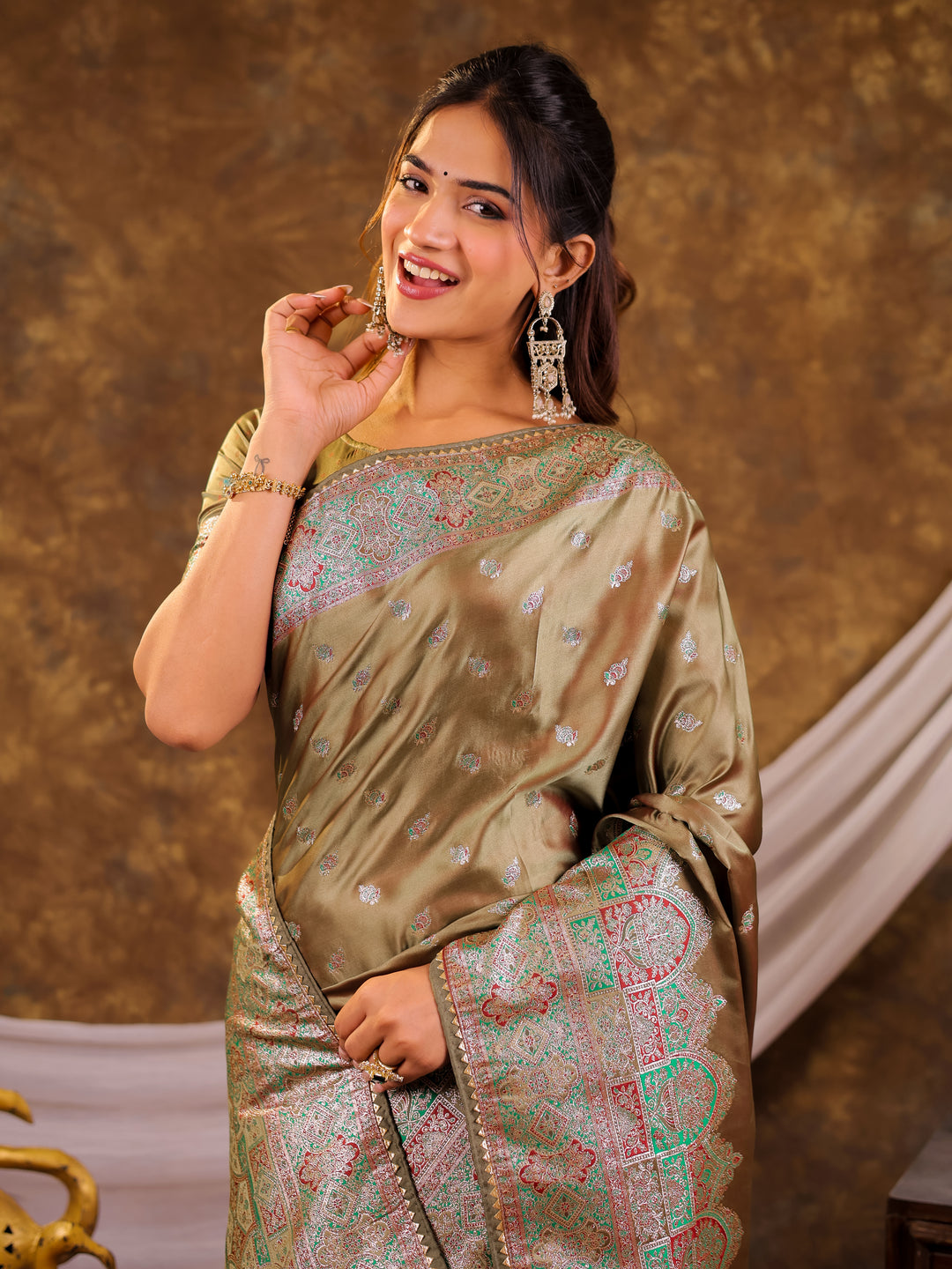 Olive Green Kanjivaram Banarasi Satin Silk Saree with Antique Silver Zari Weaving, Heritage Pallu & Tassel Detailing