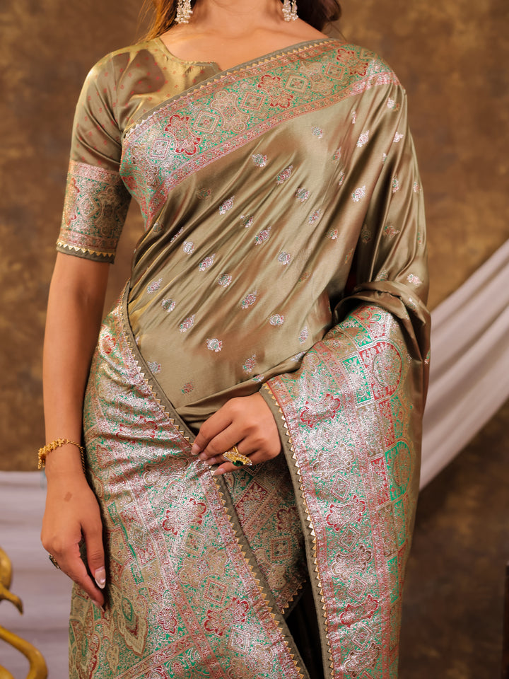 Olive Green Kanjivaram Banarasi Satin Silk Saree with Antique Silver Zari Weaving, Heritage Pallu & Tassel Detailing