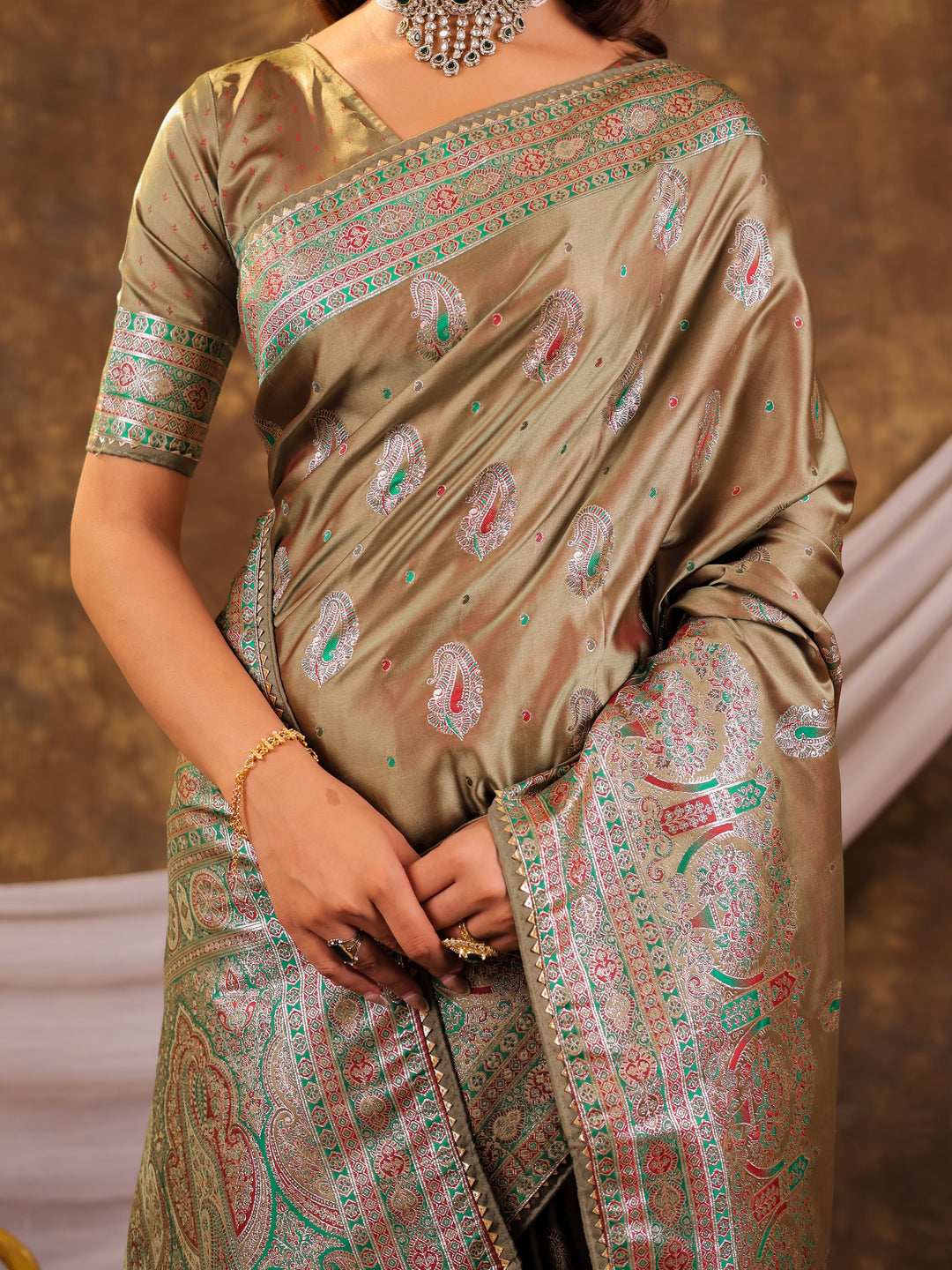 Olive Gold Kanjivaram Banarasi Satin Silk Saree with Antique Silver Zari Weaving, Heritage Pallu & Tassel Detailing