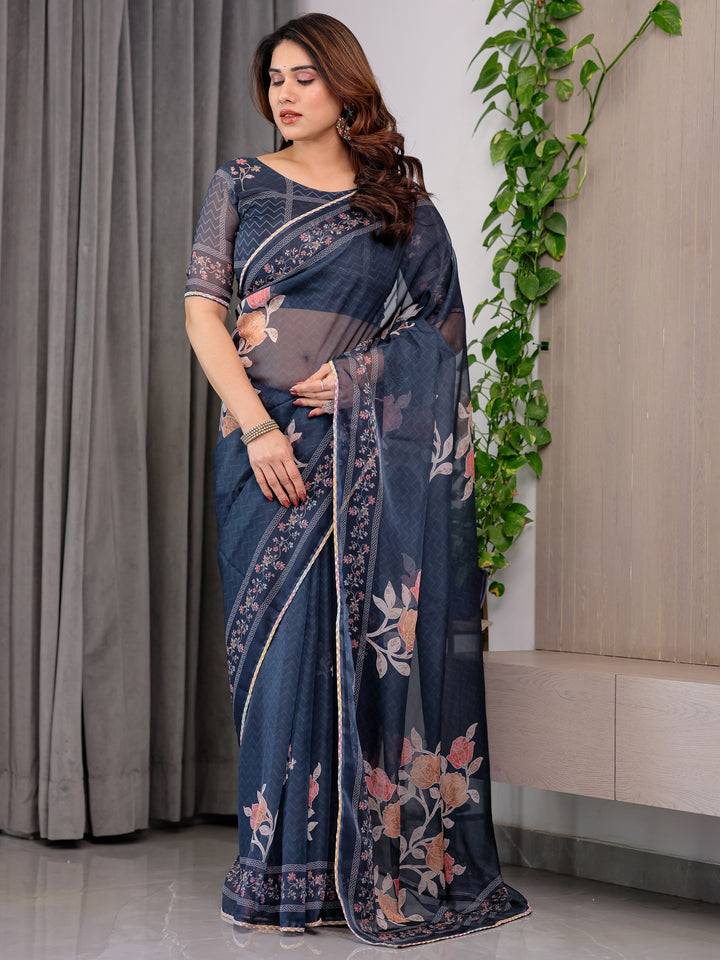 Midnight Blue Floral Printed Organza Saree with Elegant Floral Border & Multicolour Lace Edges | Designer Lightweight Organza Saree with Attached Blouse Piece | Festive & Party Wear Saree