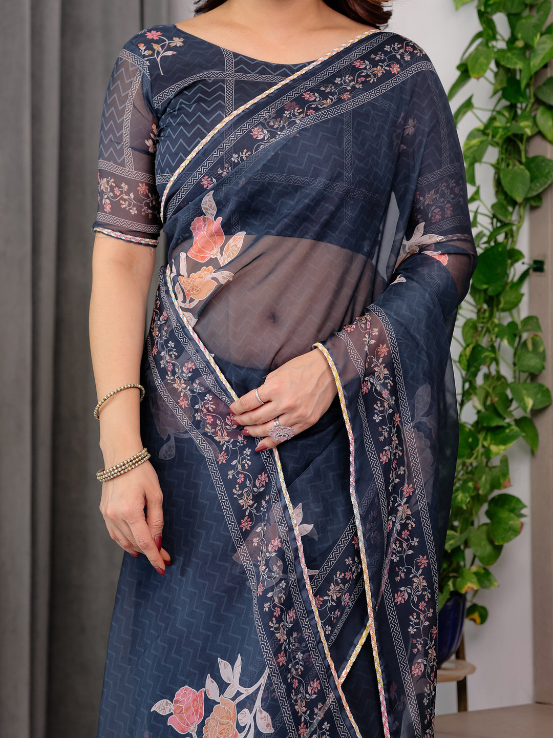 Midnight Blue Floral Printed Organza Saree with Elegant Floral Border & Multicolour Lace Edges | Designer Lightweight Organza Saree with Attached Blouse Piece | Festive & Party Wear Saree