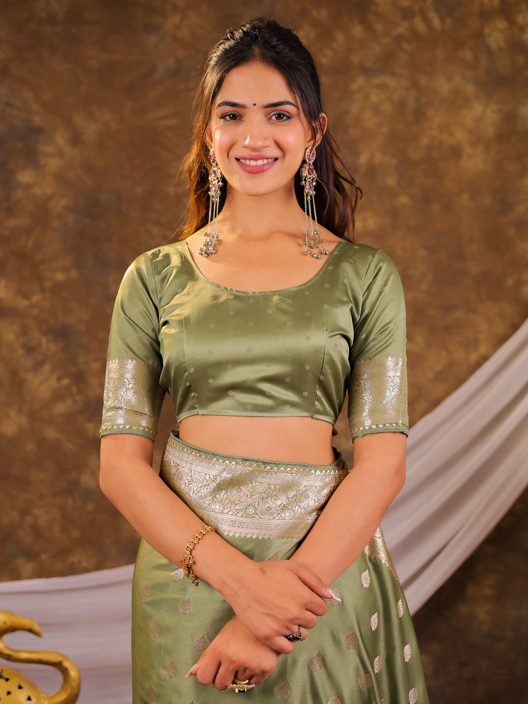 Sage Green Kanjivaram Banarasi Satin Silk Saree with Antique Silver Zari Weaving, Rich Heritage Pallu & Tassel Detailing