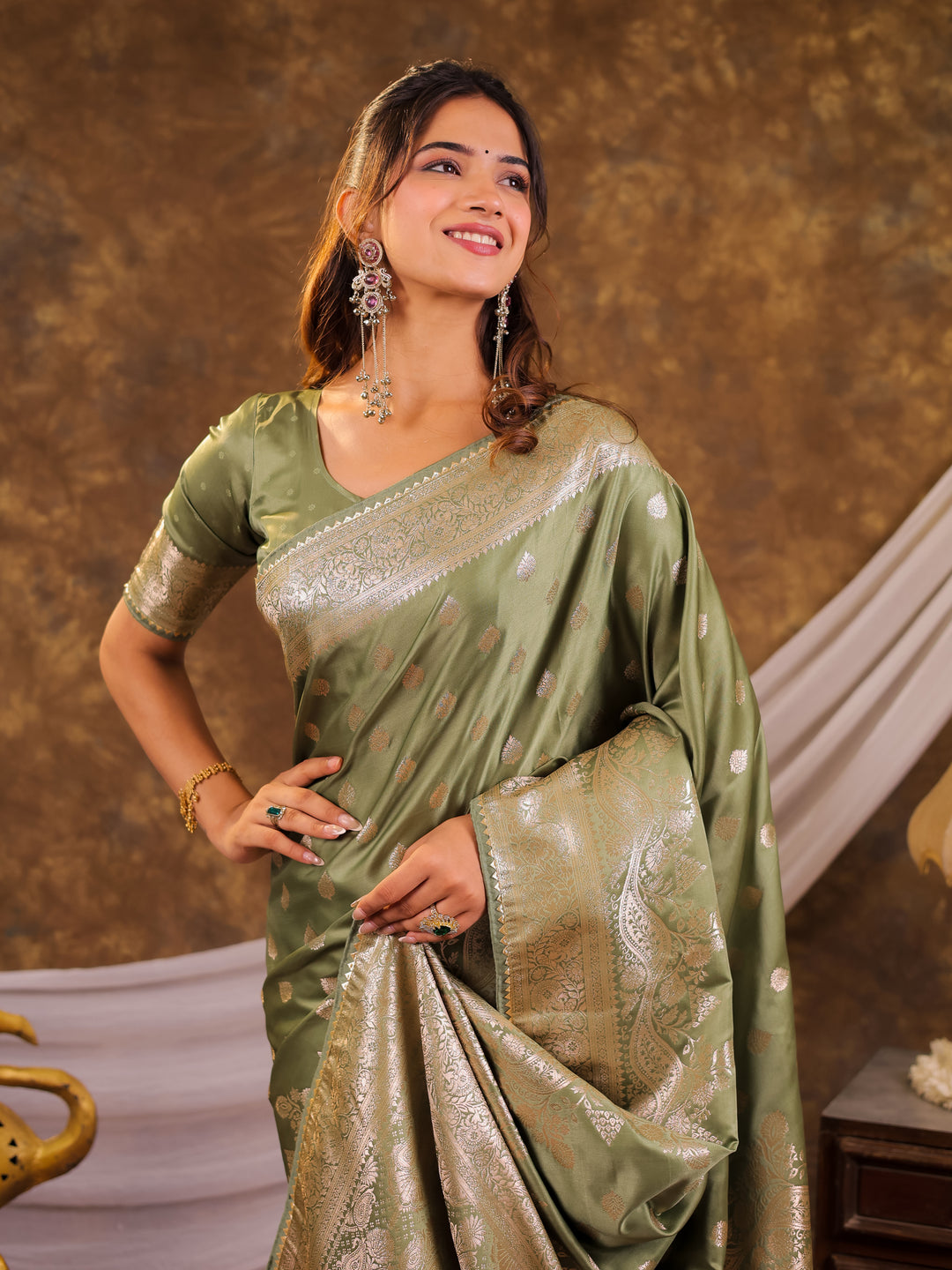 Sage Green Kanjivaram Banarasi Satin Silk Saree with Antique Silver Zari Weaving, Rich Heritage Pallu & Tassel Detailing