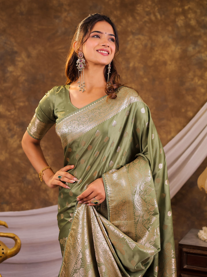 Sage Green Kanjivaram Banarasi Satin Silk Saree with Antique Silver Zari Weaving, Rich Heritage Pallu & Tassel Detailing