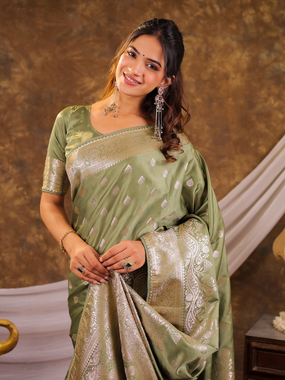 Sage Green Kanjivaram Banarasi Satin Silk Saree with Antique Silver Zari Weaving, Rich Heritage Pallu & Tassel Detailing