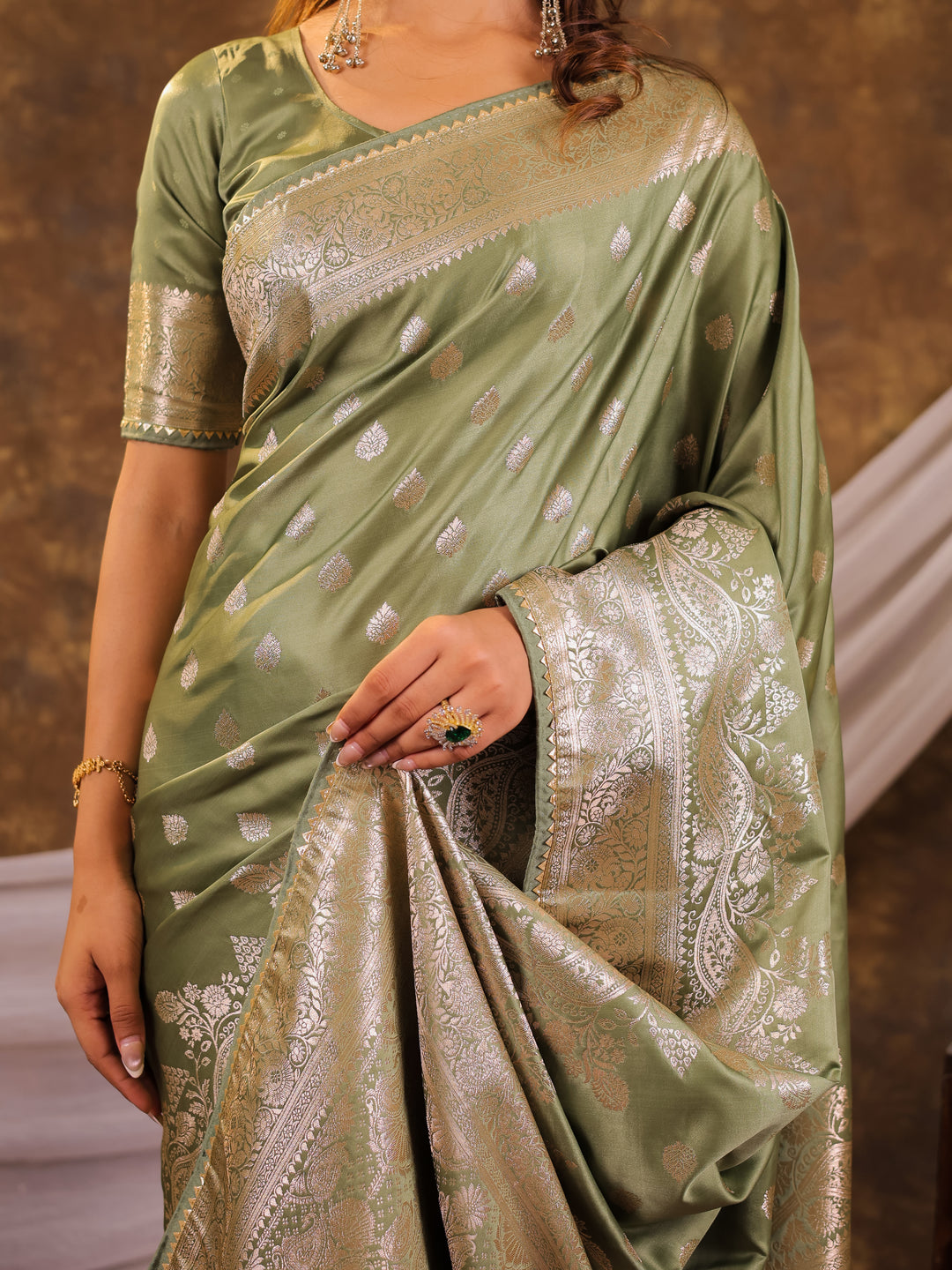 Sage Green Kanjivaram Banarasi Satin Silk Saree with Antique Silver Zari Weaving, Rich Heritage Pallu & Tassel Detailing